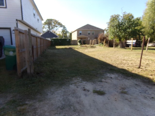 a view of a yard in front of a house