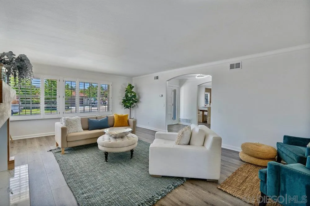 5771 Rutgers Road La Jolla, CA 92037 - Photo 11 of 75 a living room with furniture and a large window