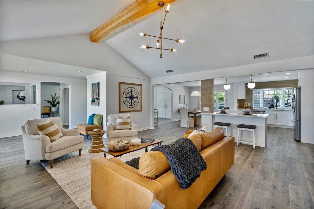 5771 Rutgers Road La Jolla, CA 92037 - Photo 16 of 75 a living room with furniture or chandelier and a wooden floor