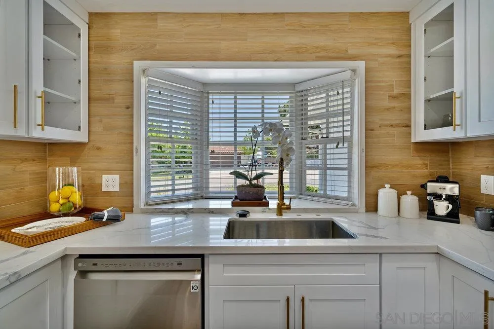 5771 Rutgers Road La Jolla, CA 92037 - Photo 29 of 75 a kitchen with a sink and a window