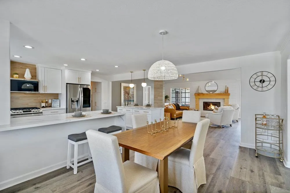 5771 Rutgers Road La Jolla, CA 92037 - Photo 35 of 75 a large kitchen with a table and chairs