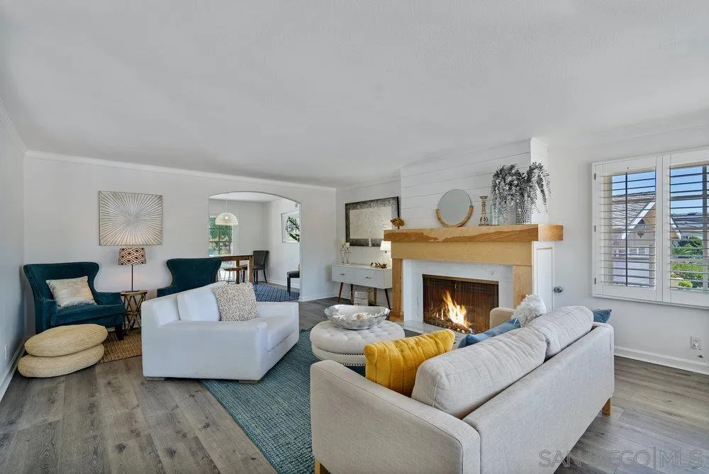 5771 Rutgers Road La Jolla, CA 92037 - Photo 5 of 75 a living room with furniture and a fireplace