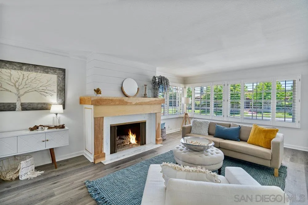 5771 Rutgers Road La Jolla, CA 92037 - Photo 7 of 75 a living room with furniture and a fireplace