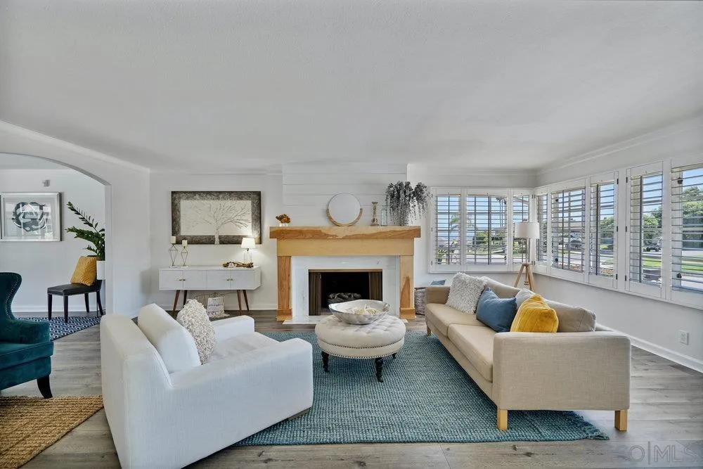 5771 Rutgers Road La Jolla, CA 92037 - Photo 8 of 75 a living room with furniture and a fireplace