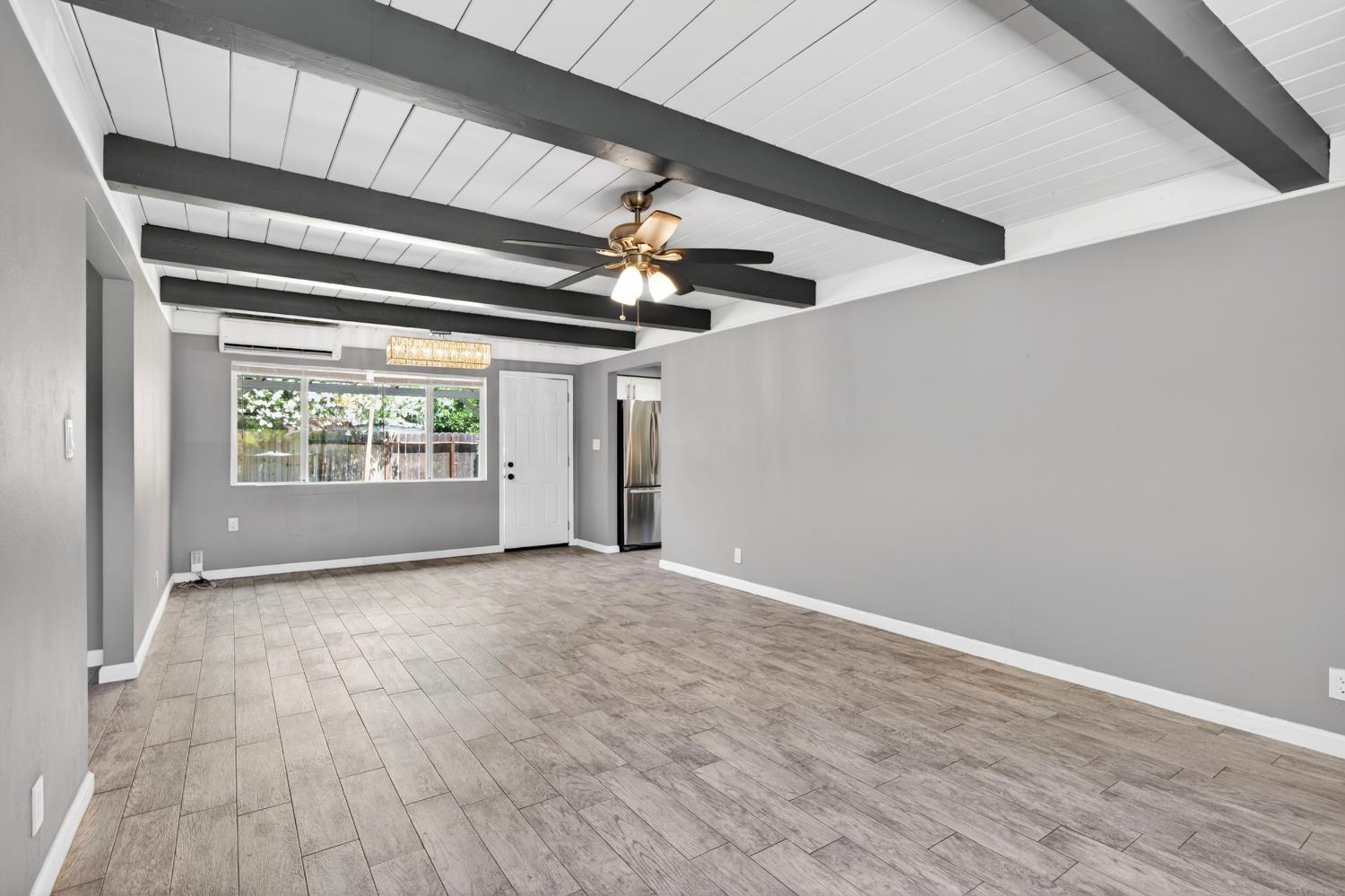 1921 Calhoun Way Stockton, CA 95207 - Photo 5 of 35 Durable and on trend wood look Tile Floors throughout.