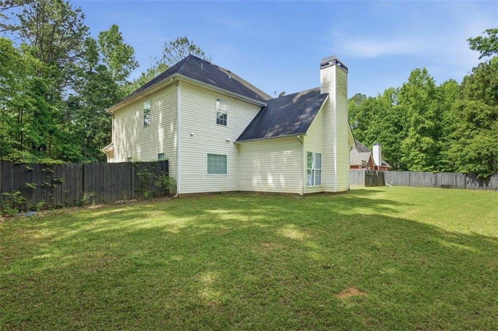1231 Hillview Road Hampton, GA 30228 - Photo 36 of 49 a view of a backyard with a garden