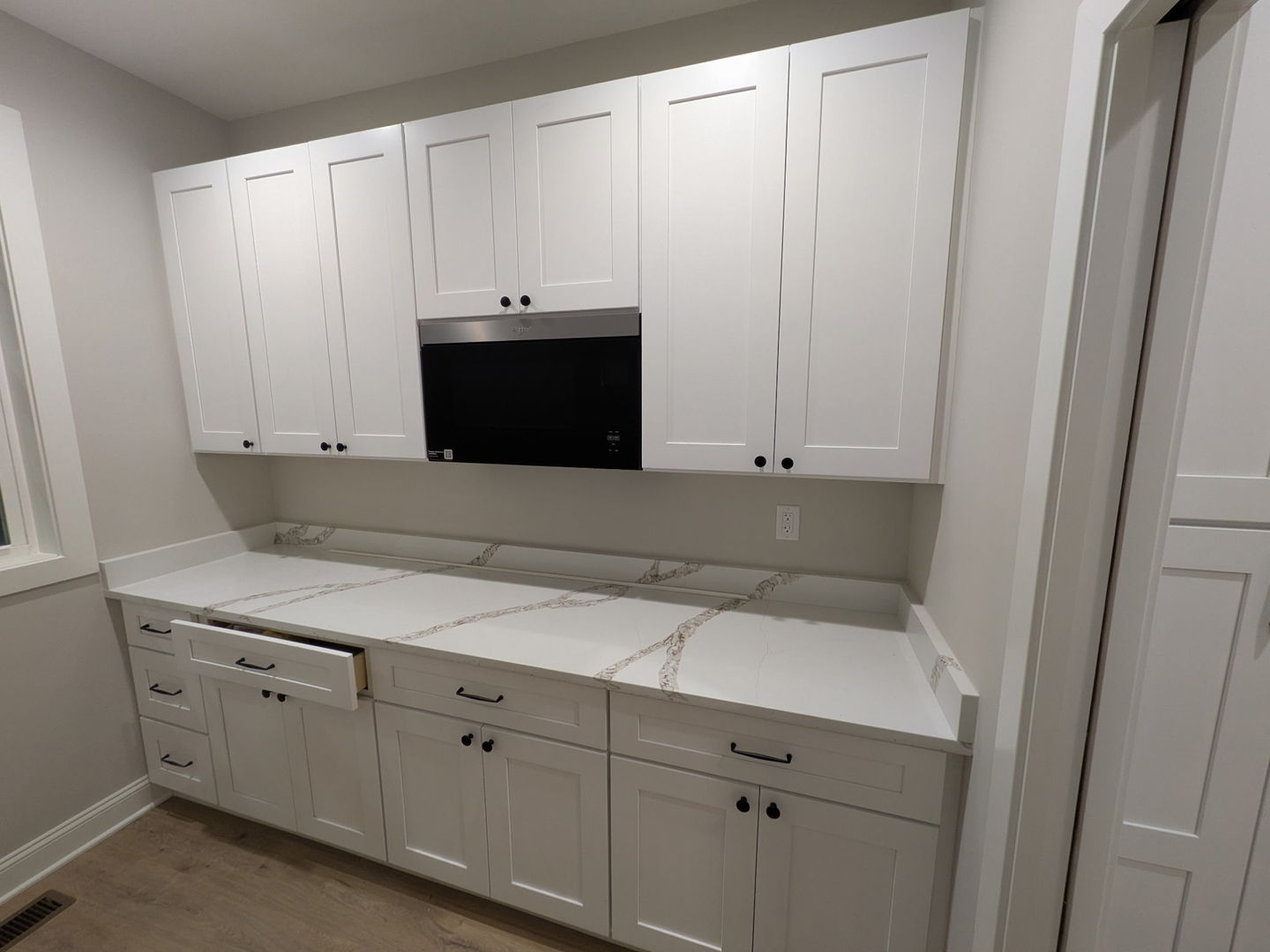 675 South Regulators Street Rochelle, IL 61068 - Photo 11 of 26 a kitchen with white cabinets and sink