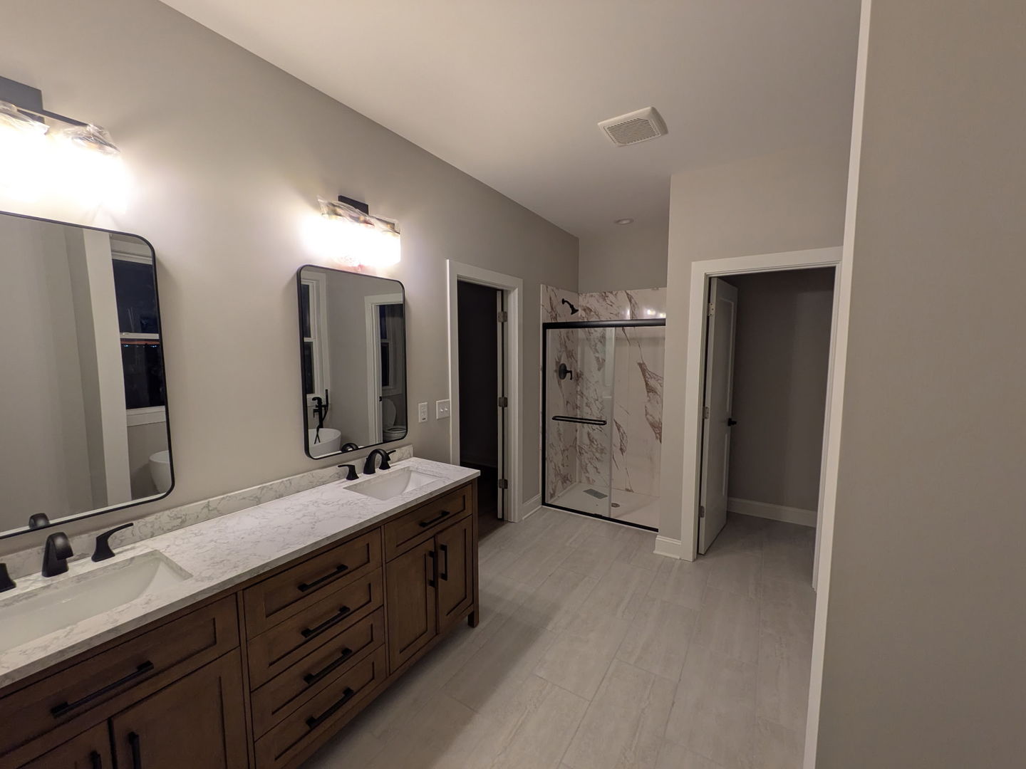 675 South Regulators Street Rochelle, IL 61068 - Photo 19 of 26 a spacious bathroom with a double vanity sink double and mirror