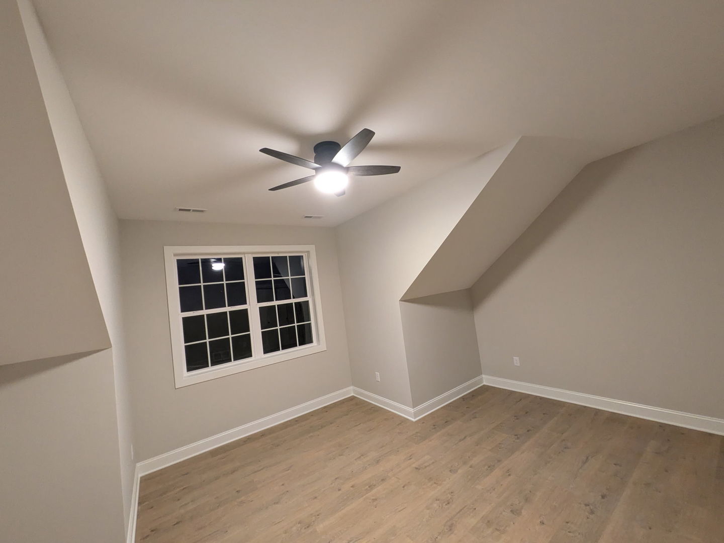 675 South Regulators Street Rochelle, IL 61068 - Photo 20 of 26 wooden floor in an empty room with a window