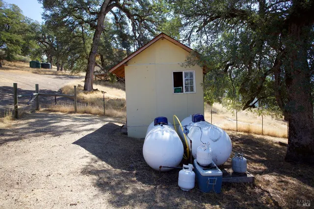 a view of a backyard of a house