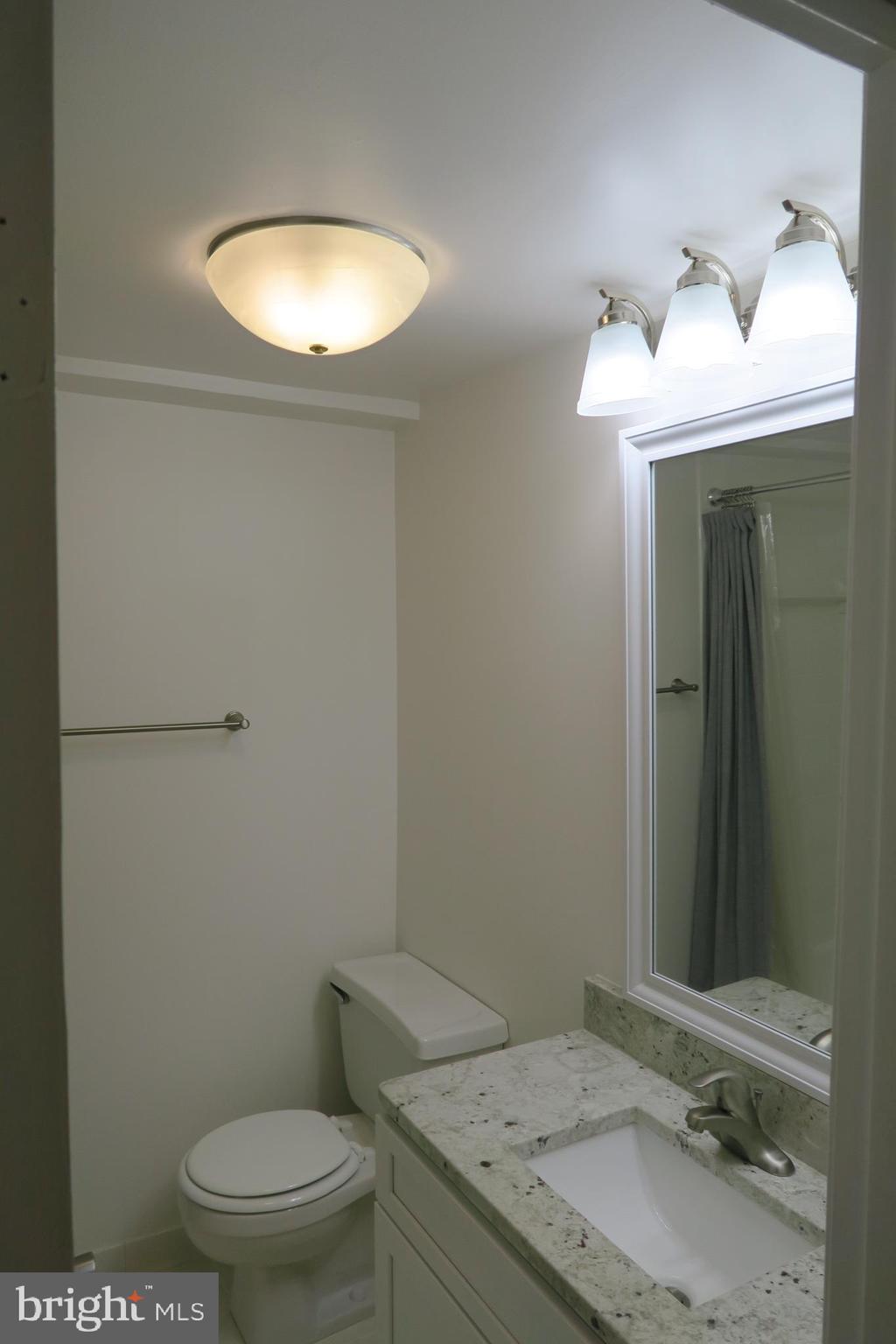 1825 T Street Northwest, Unit 303 Washington, DC 20009 - Photo 8 of 16 Well-lit bathroom