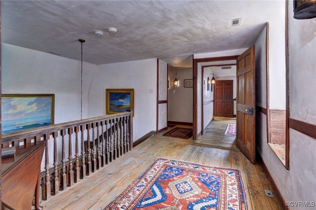 1425 Twiggs Ferry Road Hartfield, VA 23071 - Photo 31 of 50 a view of hallway with wooden floor
