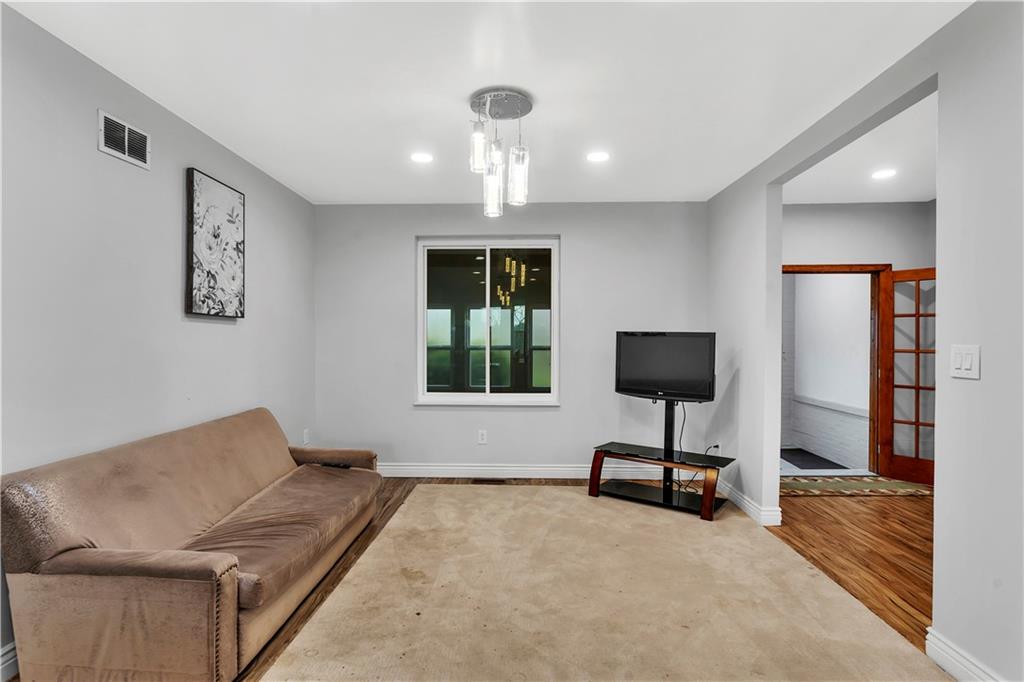 25 Clearview Avenue Duquesne, PA 15110 - Photo 11 of 33 a living room with furniture and a flat screen tv