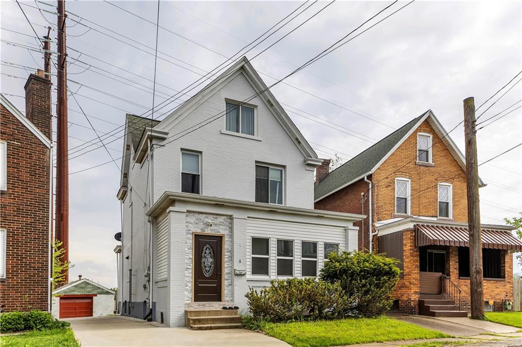 25 Clearview Avenue Duquesne, PA 15110 - Photo 2 of 33 a view of a white building among the yard