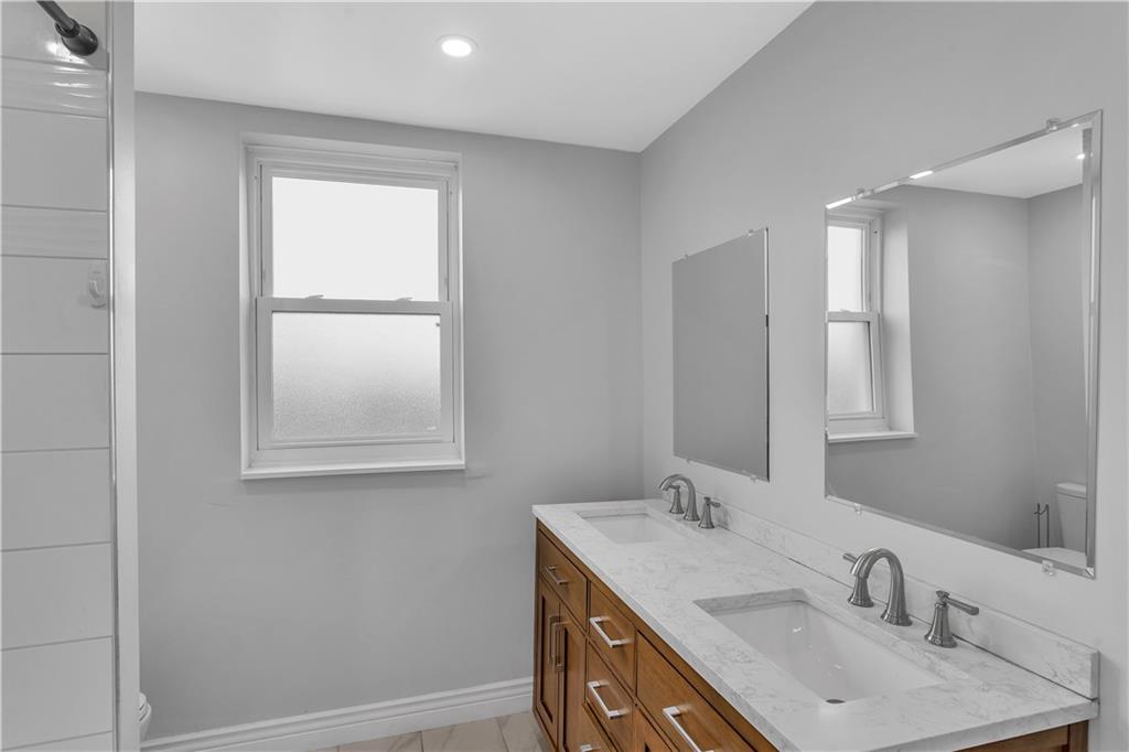 25 Clearview Avenue Duquesne, PA 15110 - Photo 29 of 33 a bathroom with a sink vanity and a mirror