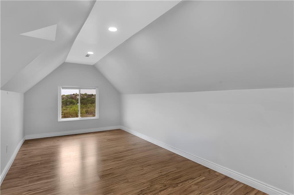 25 Clearview Avenue Duquesne, PA 15110 - Photo 30 of 33 an empty room with wooden floor and windows