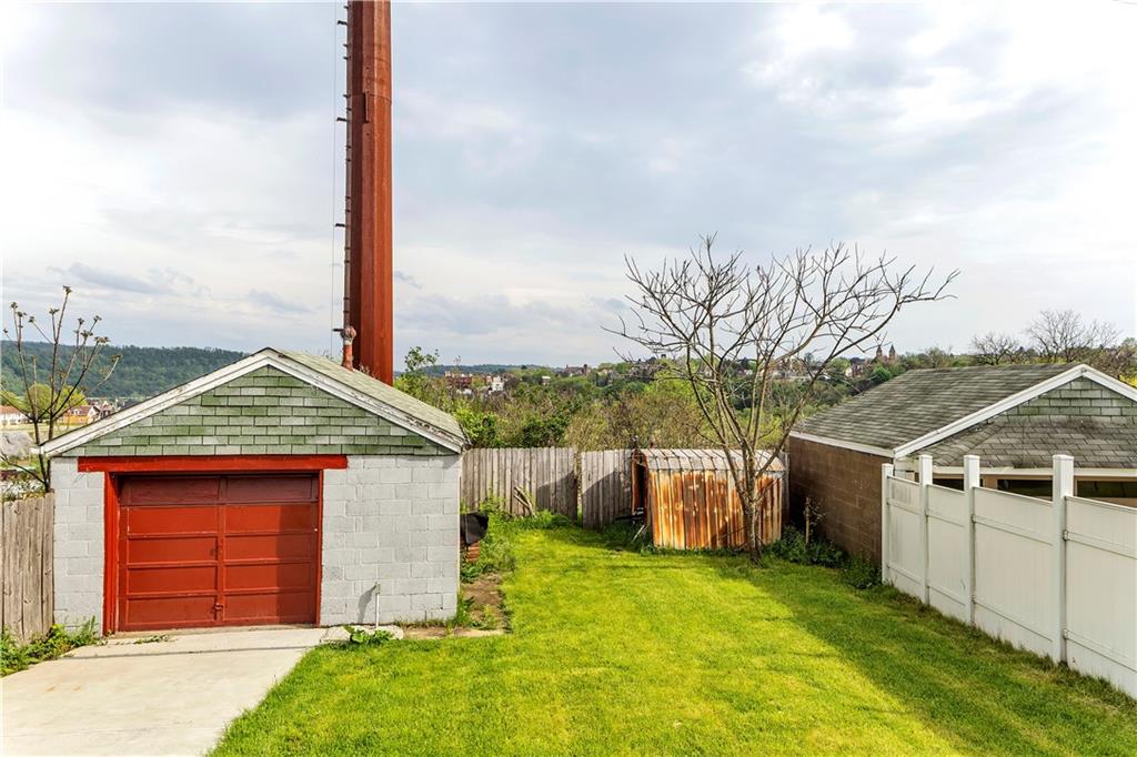 25 Clearview Avenue Duquesne, PA 15110 - Photo 32 of 33 a front view of a house with a yard