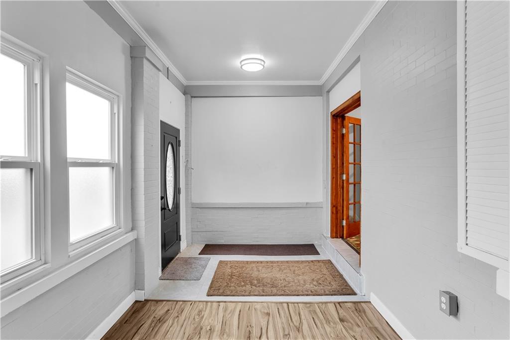25 Clearview Avenue Duquesne, PA 15110 - Photo 6 of 33 a view of hallway with window and wooden floor