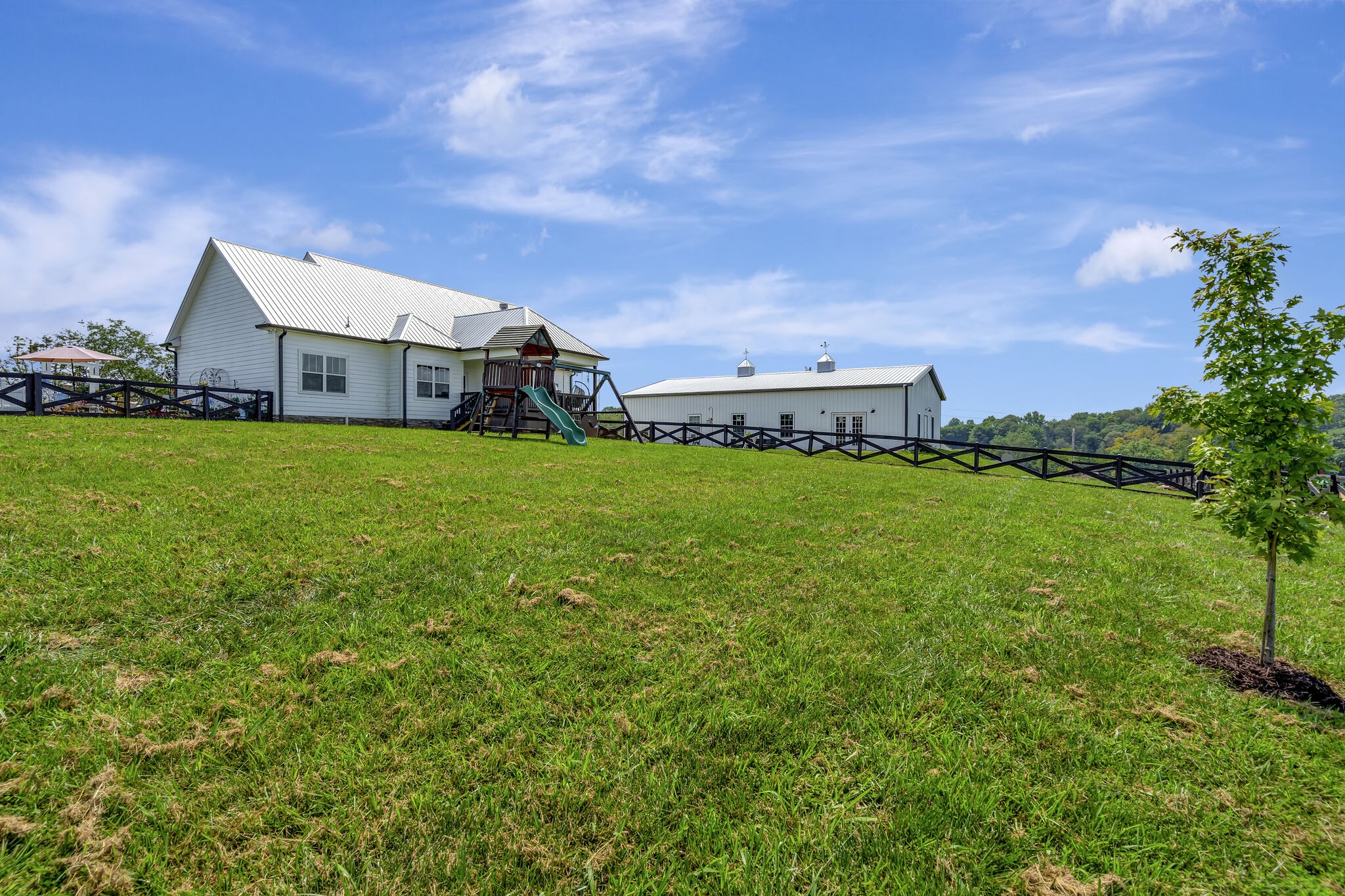 4002 Highway 49 Springfield, TN 37172 - Photo 41 of 70 a view of a big house with a big yard and large trees