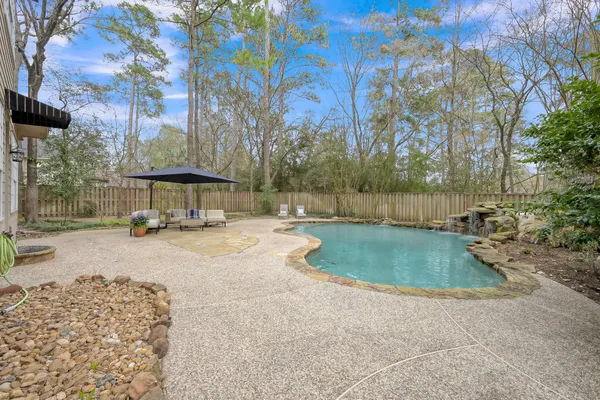 $885,000 | 58 Candle Pine Place, The Woodlands, TX 77381