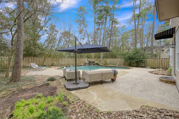 $885,000 | 58 Candle Pine Place, The Woodlands, TX 77381