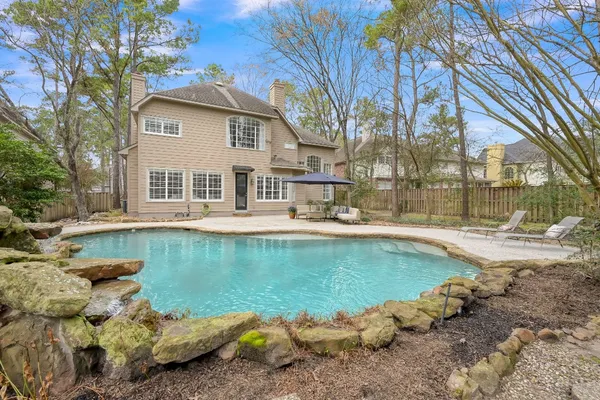 $885,000 | 58 Candle Pine Place, The Woodlands, TX 77381