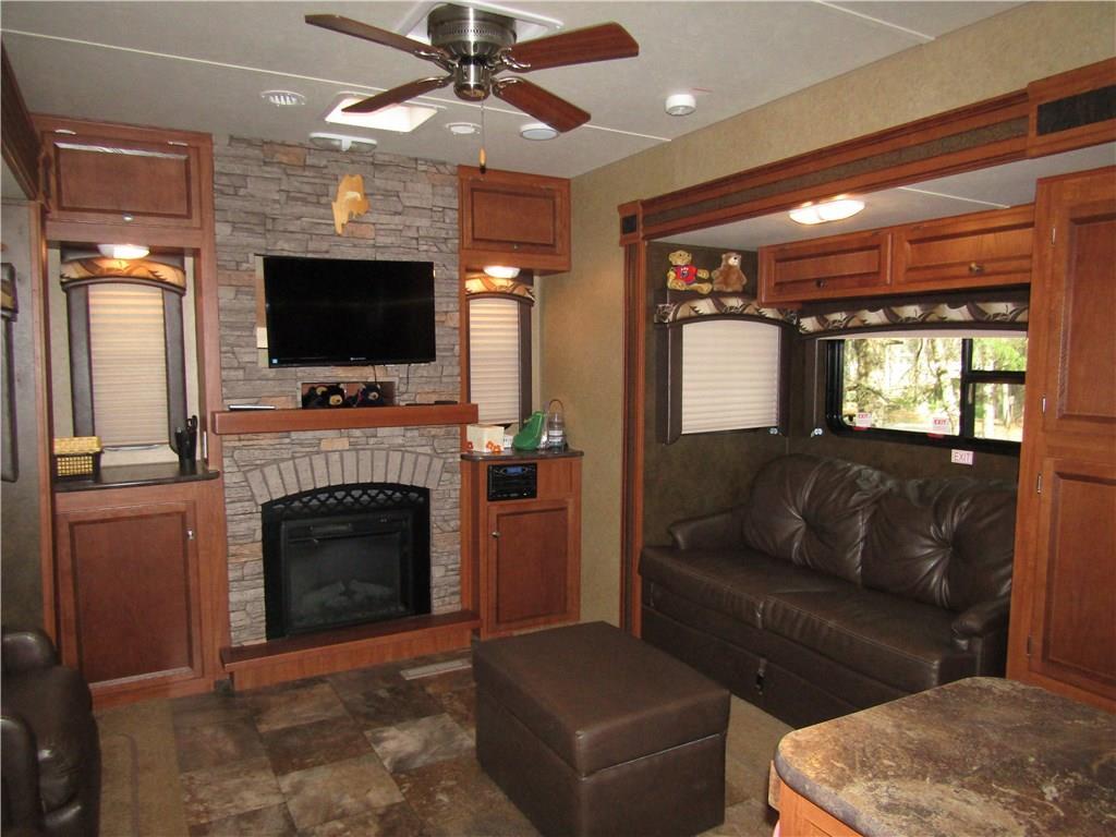 25 Indian Point Road, Unit 51 Raymond, ME 04071 - Photo 5 of 16 Comfortable Living Room with an...