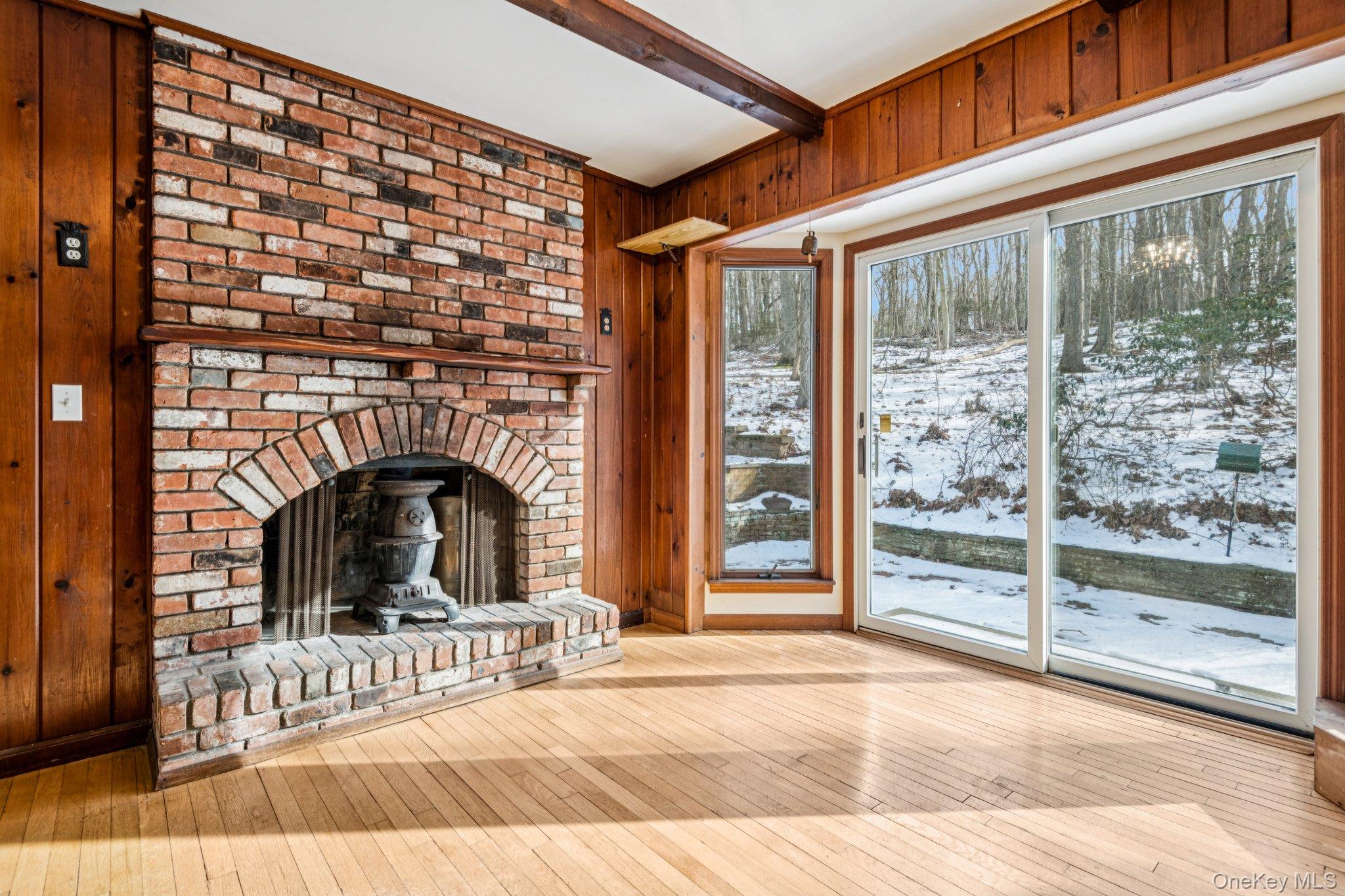 1 Spring Hollow Road St. James, NY 11780 - Photo 15 of 30 a view of a livingroom with a fireplace