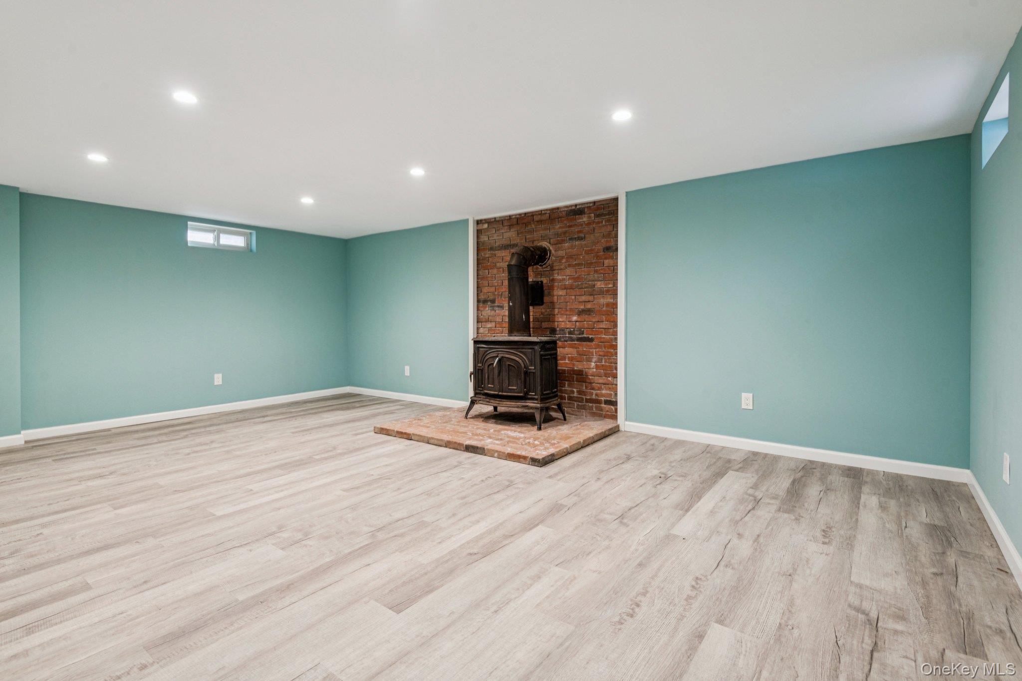 1 Spring Hollow Road St. James, NY 11780 - Photo 26 of 30 a view of empty room with wooden floor