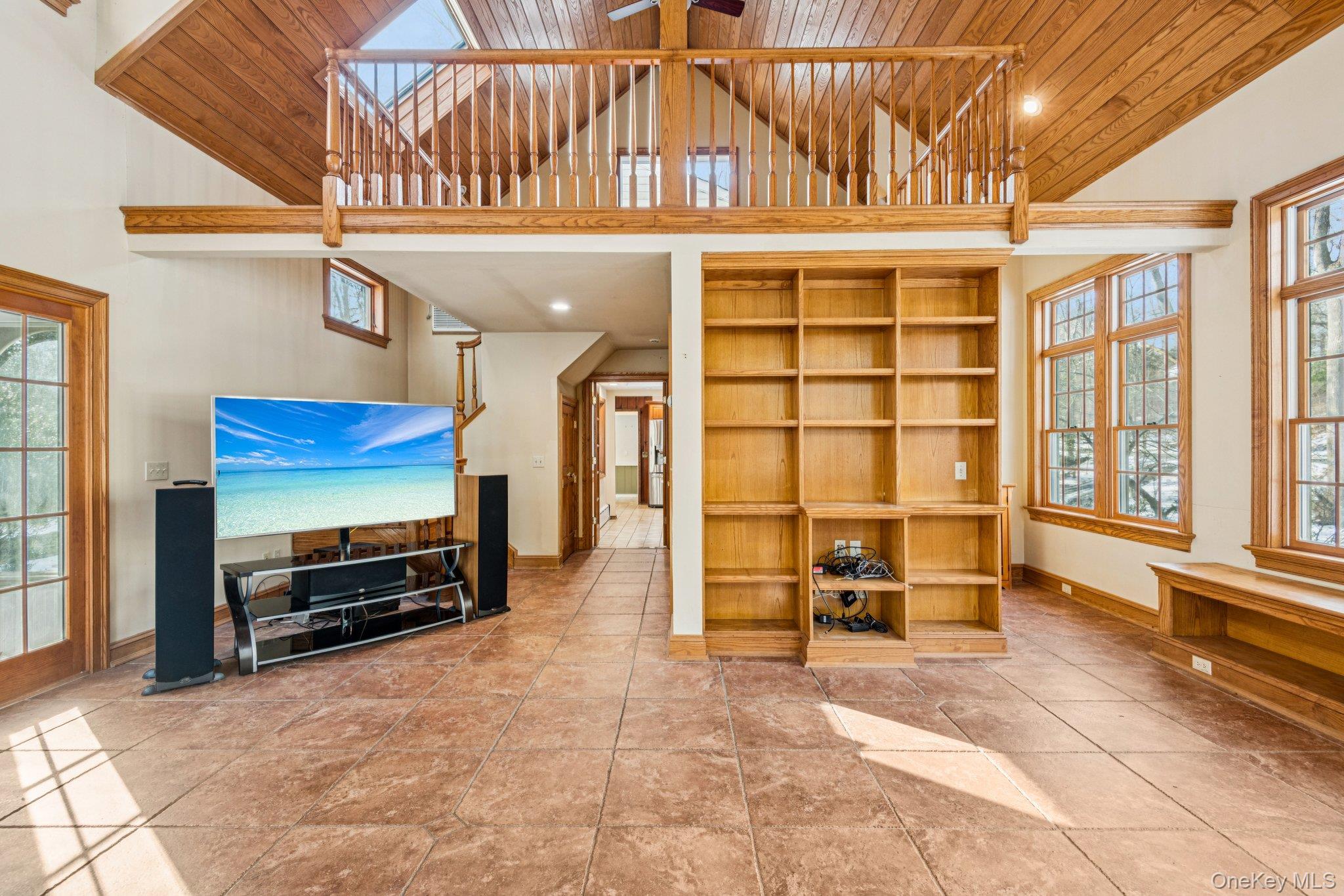 1 Spring Hollow Road St. James, NY 11780 - Photo 5 of 30 a view of a livingroom with furniture and a window