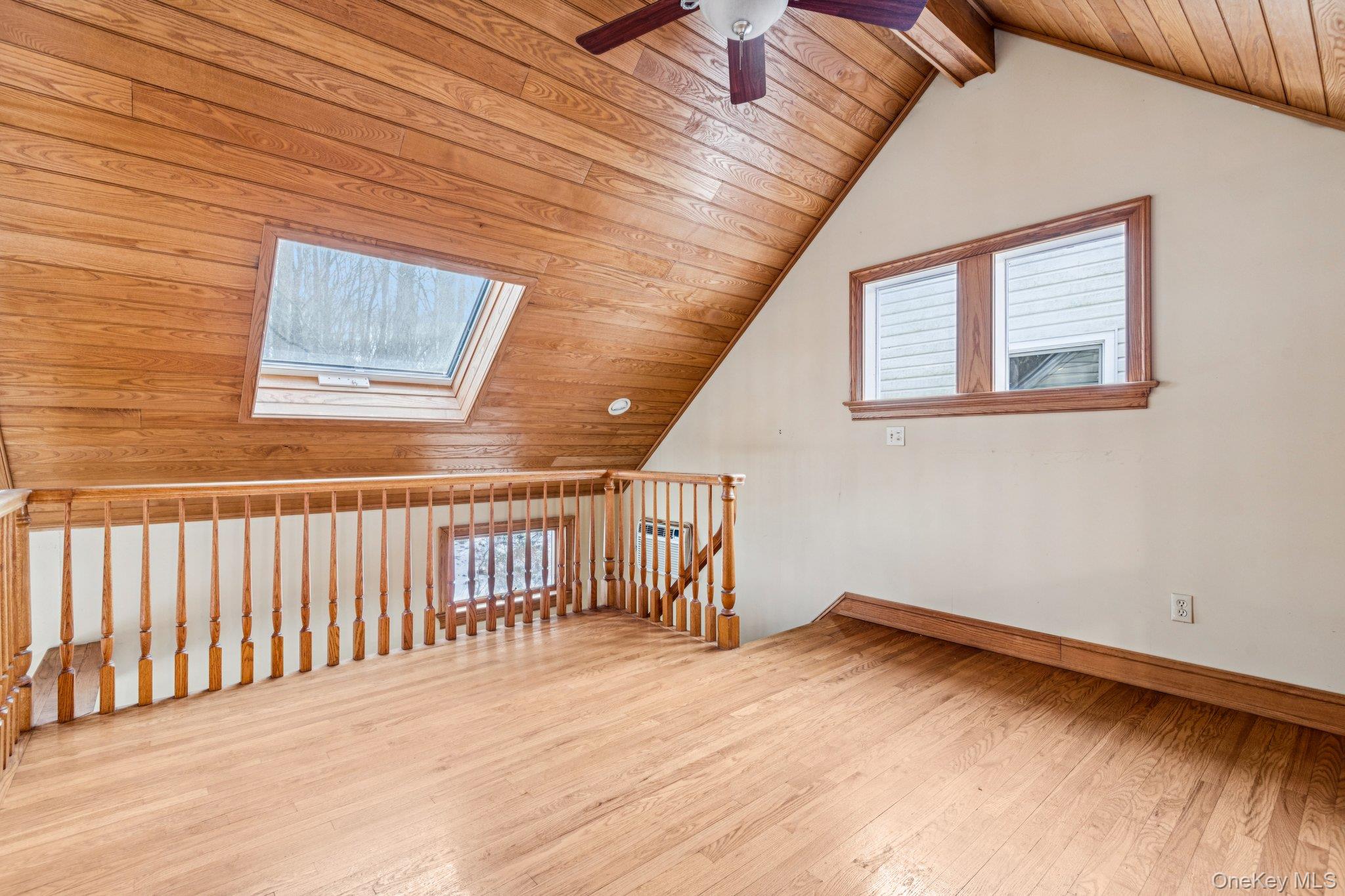 1 Spring Hollow Road St. James, NY 11780 - Photo 7 of 30 a view of an entryway with wooden floor