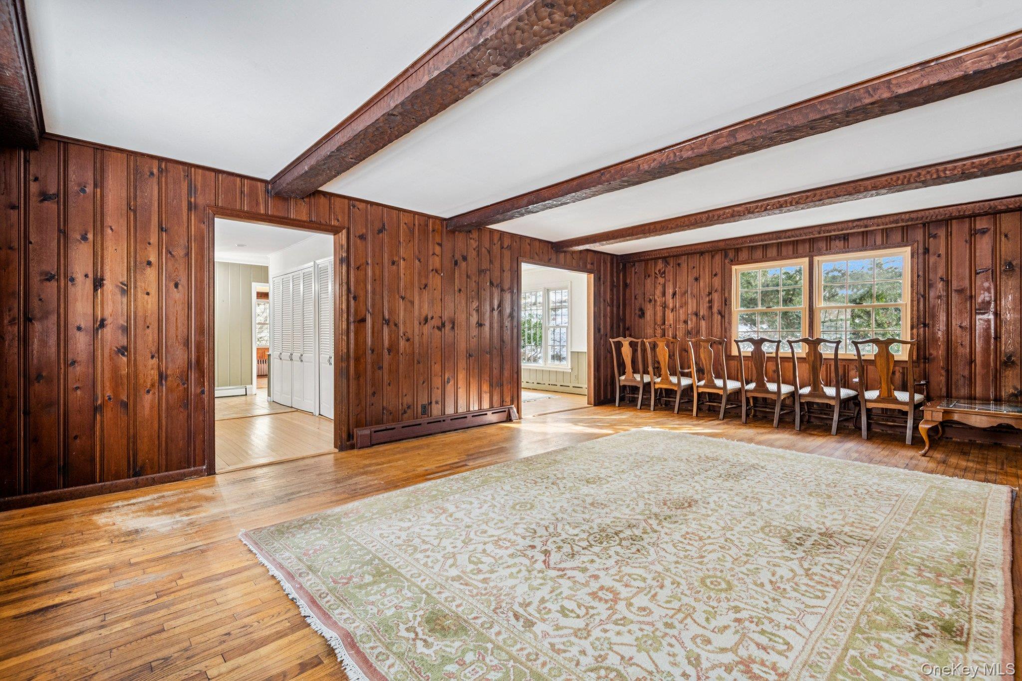 1 Spring Hollow Road St. James, NY 11780 - Photo 9 of 30 a view of a room with furniture and a large window