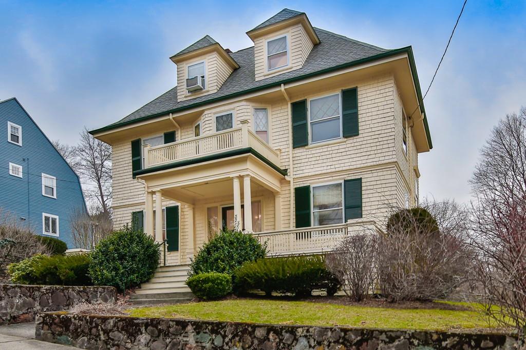 33 Robbins Road Arlington, MA 02476 - Photo 3 of 36 a front view of a house with a yard