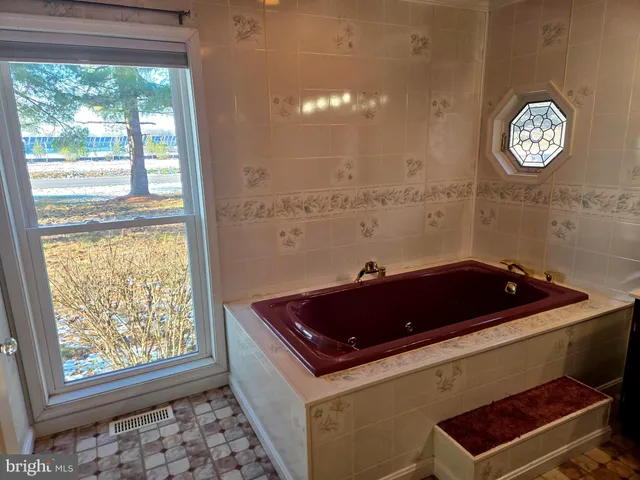 a room with furniture and window