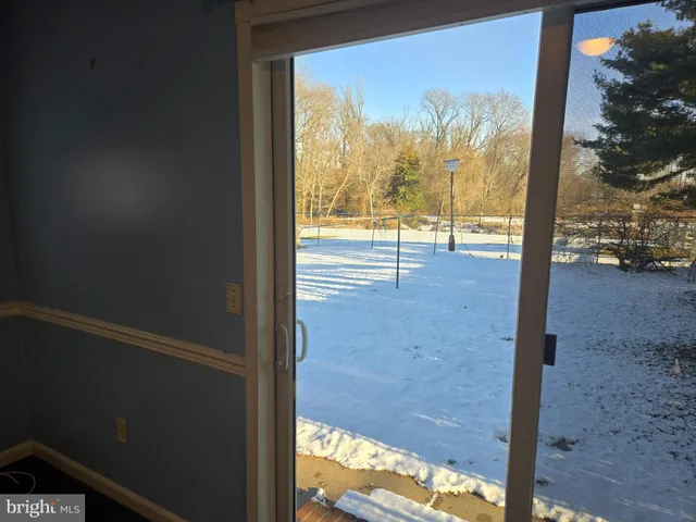 a view of a yard from a balcony