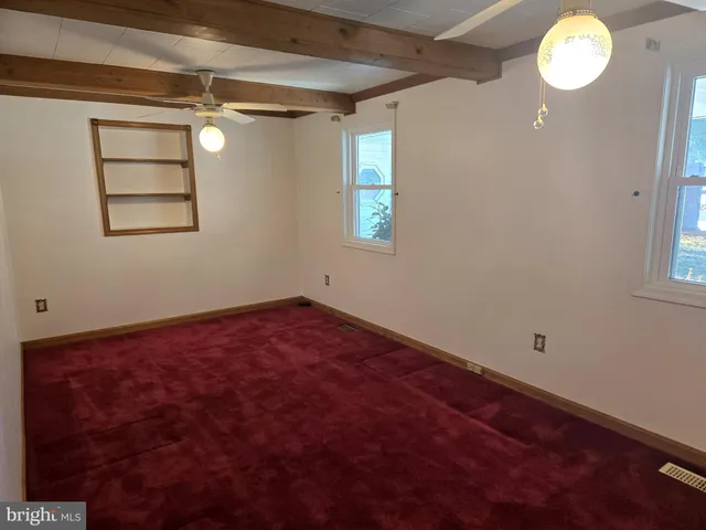 a view of empty room with window