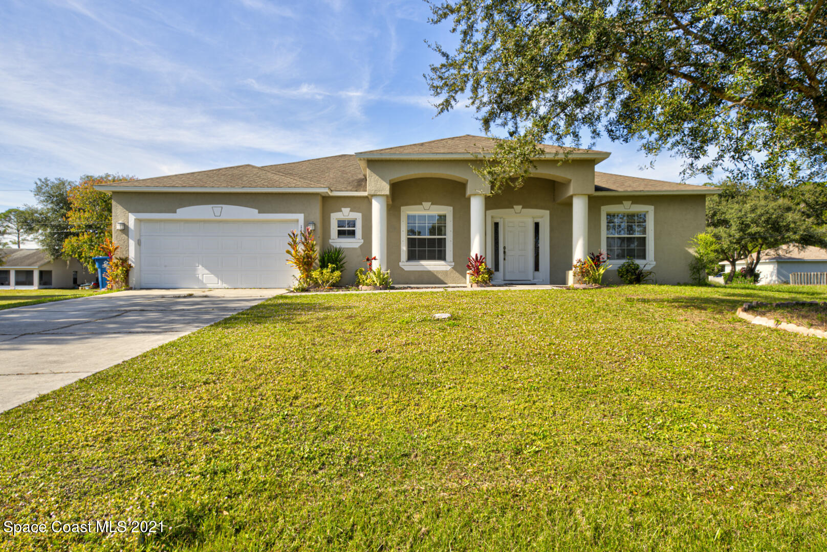 1483 Wakefield Road Southeast Palm Bay, FL 32909 - Photo 1 of 42 a view of a house with a swimming pool