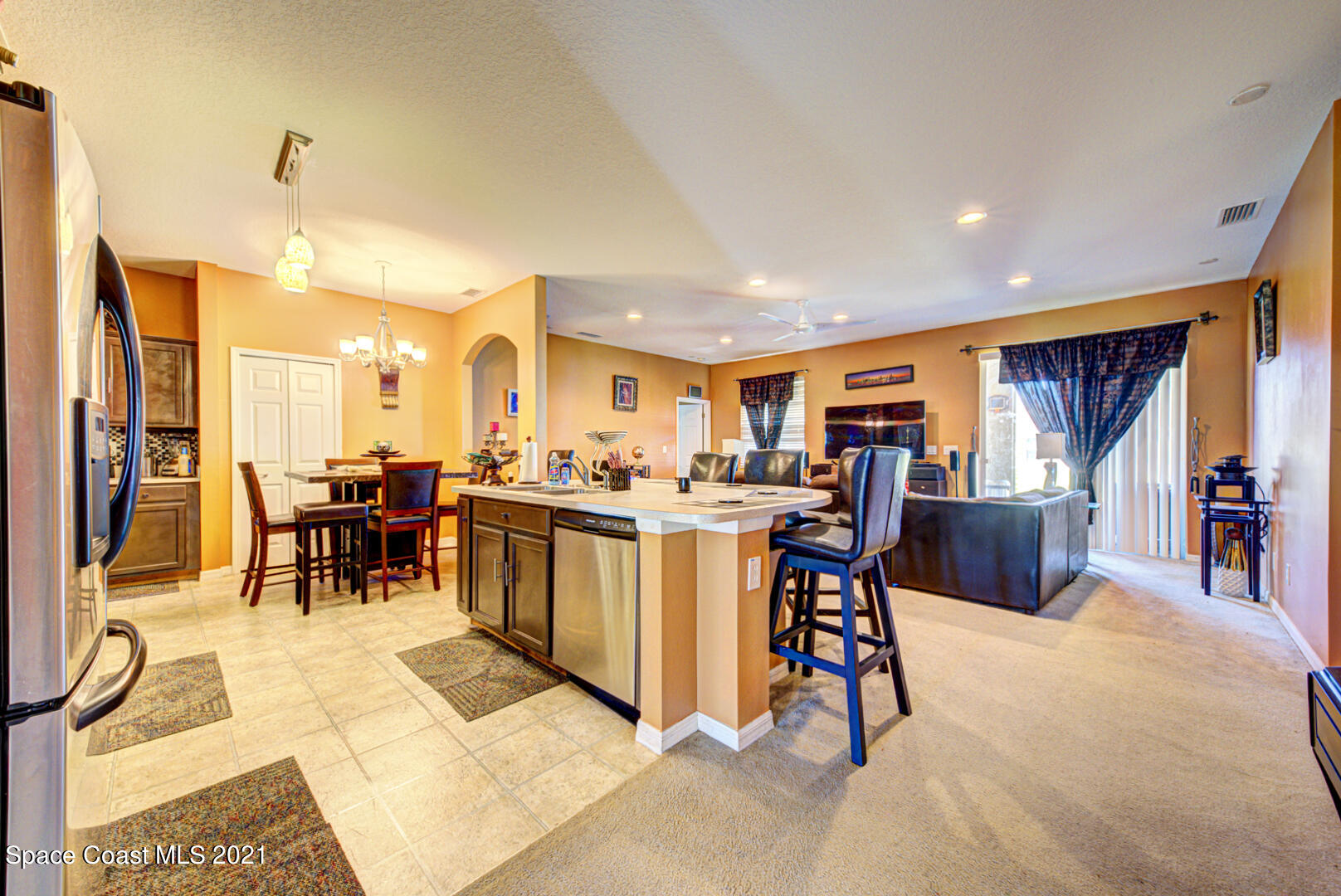 1483 Wakefield Road Southeast Palm Bay, FL 32909 - Photo 20 of 42 a view of a dining room with furniture