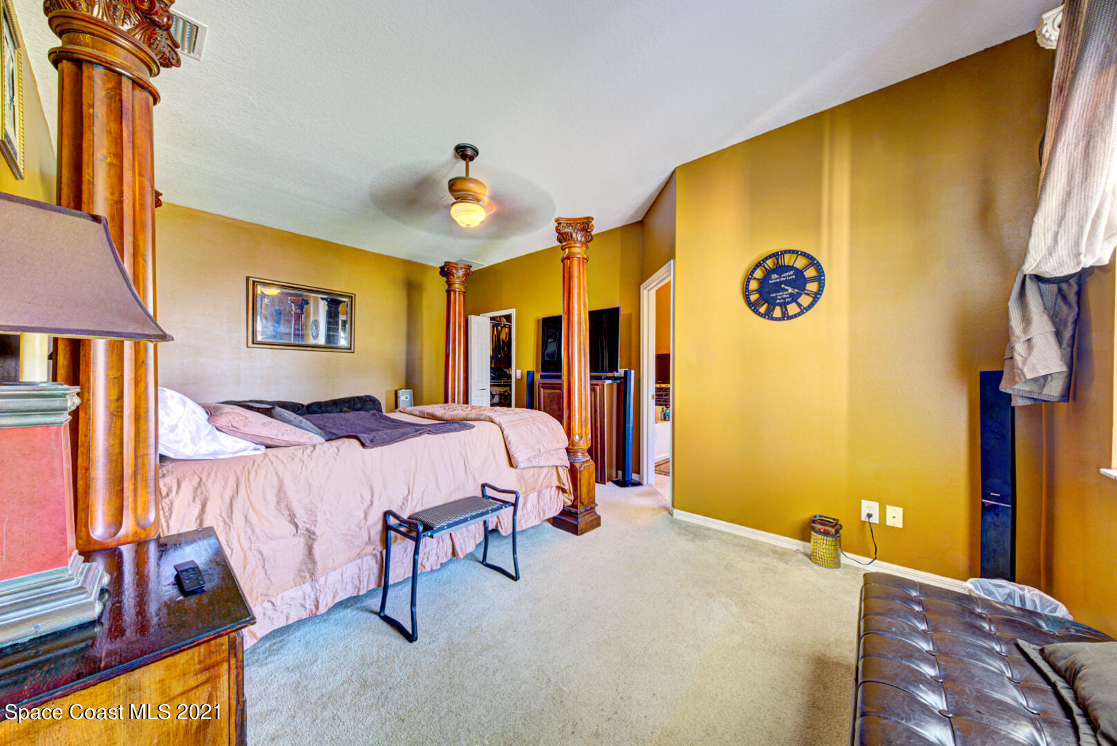 1483 Wakefield Road Southeast Palm Bay, FL 32909 - Photo 29 of 42 a bed room with a bed and a couch