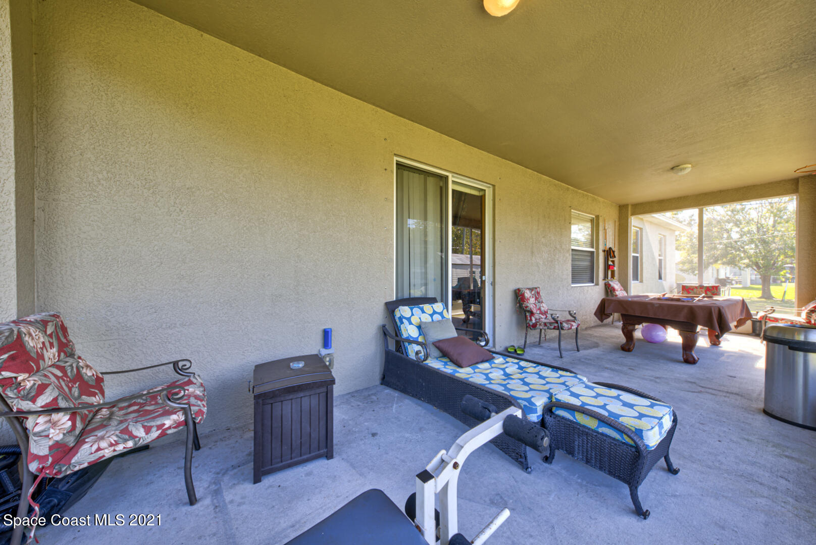 1483 Wakefield Road Southeast Palm Bay, FL 32909 - Photo 42 of 42 a living room with furniture and a wooden floor