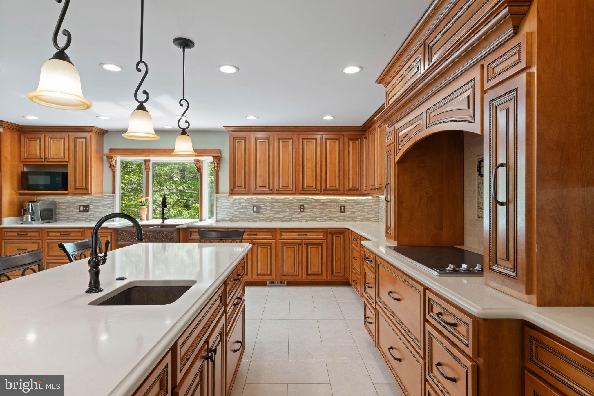 12522 Spring Drive Manassas, VA 20112 - Photo 22 of 69 Warm wood tones in a spacious kitchen.