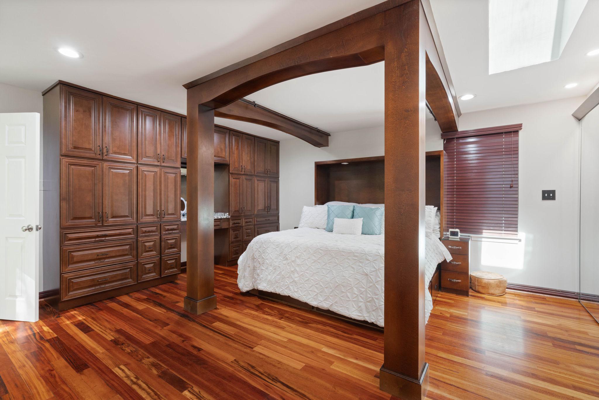 12522 Spring Drive Manassas, VA 20112 - Photo 28 of 69 Elegant Primary bedroom with rich wood accents.