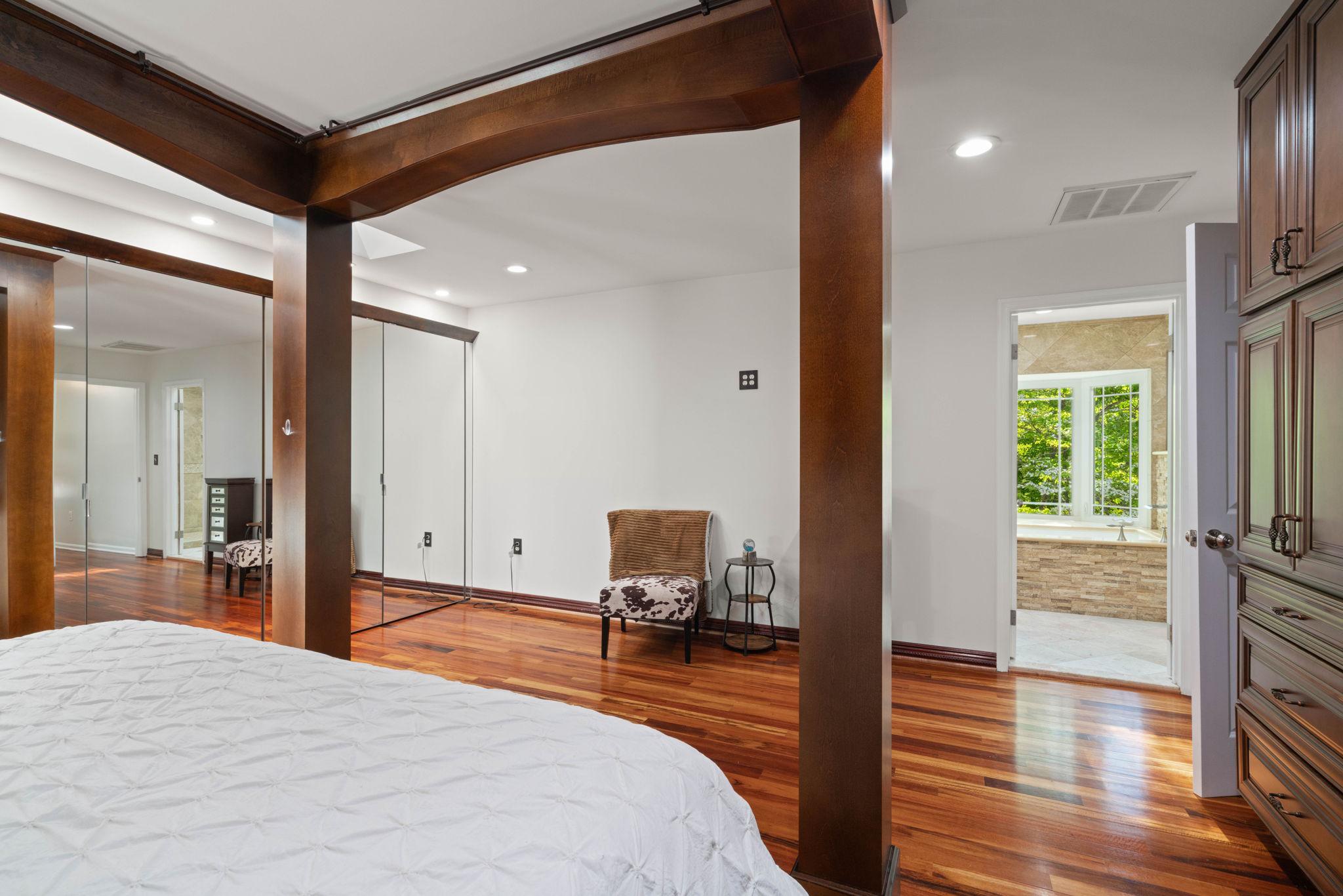 12522 Spring Drive Manassas, VA 20112 - Photo 29 of 69 Serene primary bedroom with elegant wood accents.