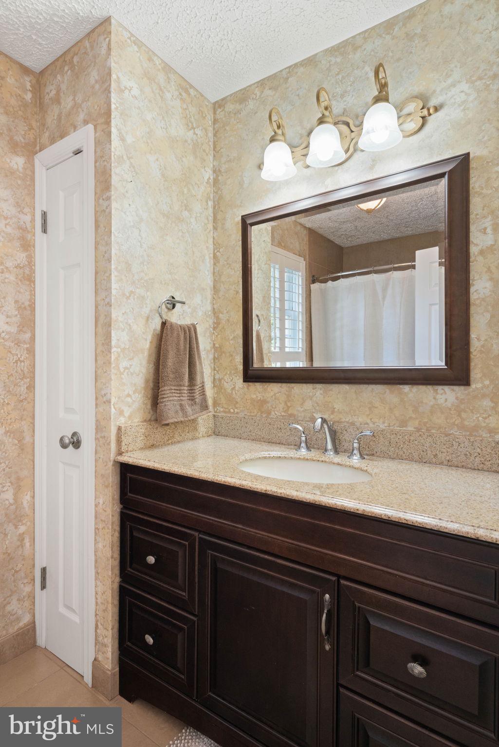 12522 Spring Drive Manassas, VA 20112 - Photo 45 of 69 Elegant bathroom 3 with warm tones.