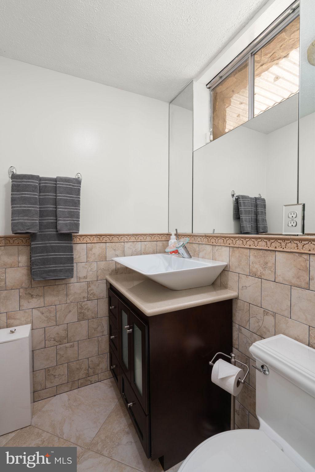 12522 Spring Drive Manassas, VA 20112 - Photo 49 of 69 Modern elegance in a serene bathroom.