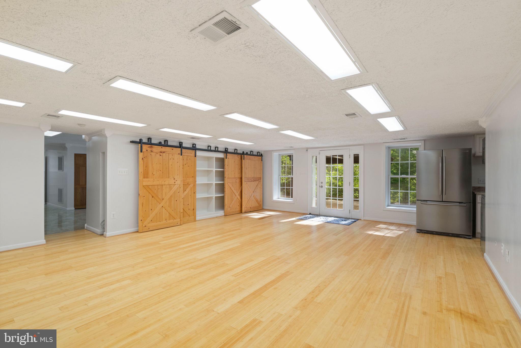 12522 Spring Drive Manassas, VA 20112 - Photo 53 of 69 Spacious, sunlit open area awaits creativity.
