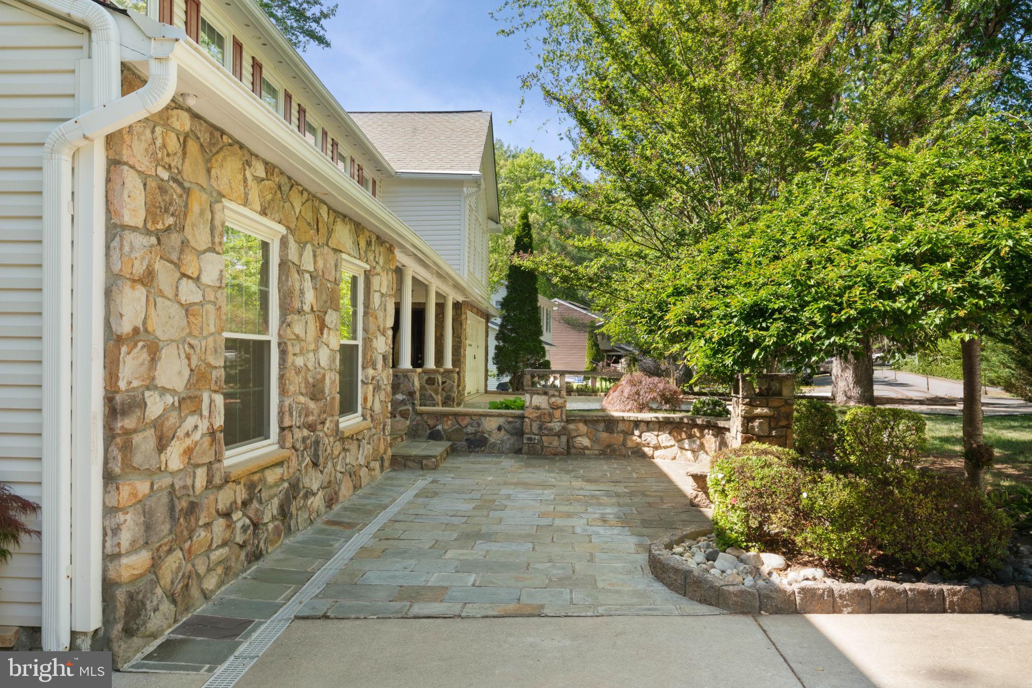 12522 Spring Drive Manassas, VA 20112 - Photo 7 of 69 Charming stone pathway to serene garden.