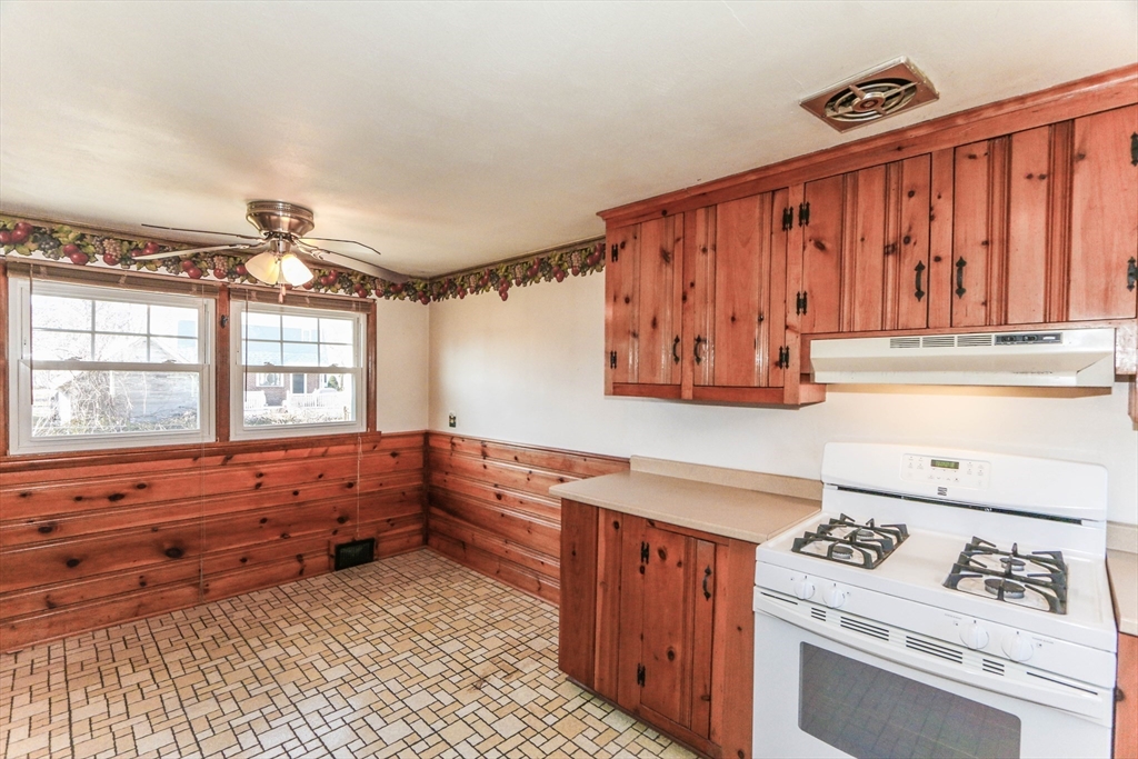 185 East Street Springfield, MA 01104 - Photo 12 of 26 a kitchen with stainless steel appliances a stove and a refrigerator