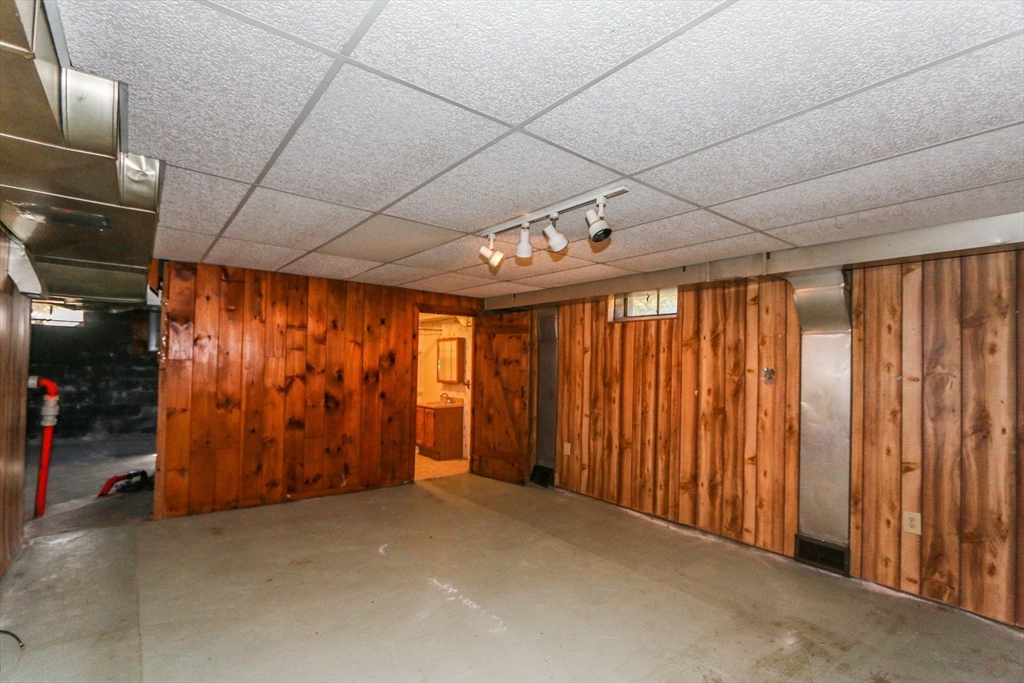 185 East Street Springfield, MA 01104 - Photo 22 of 26 a view of an empty room with wooden walls