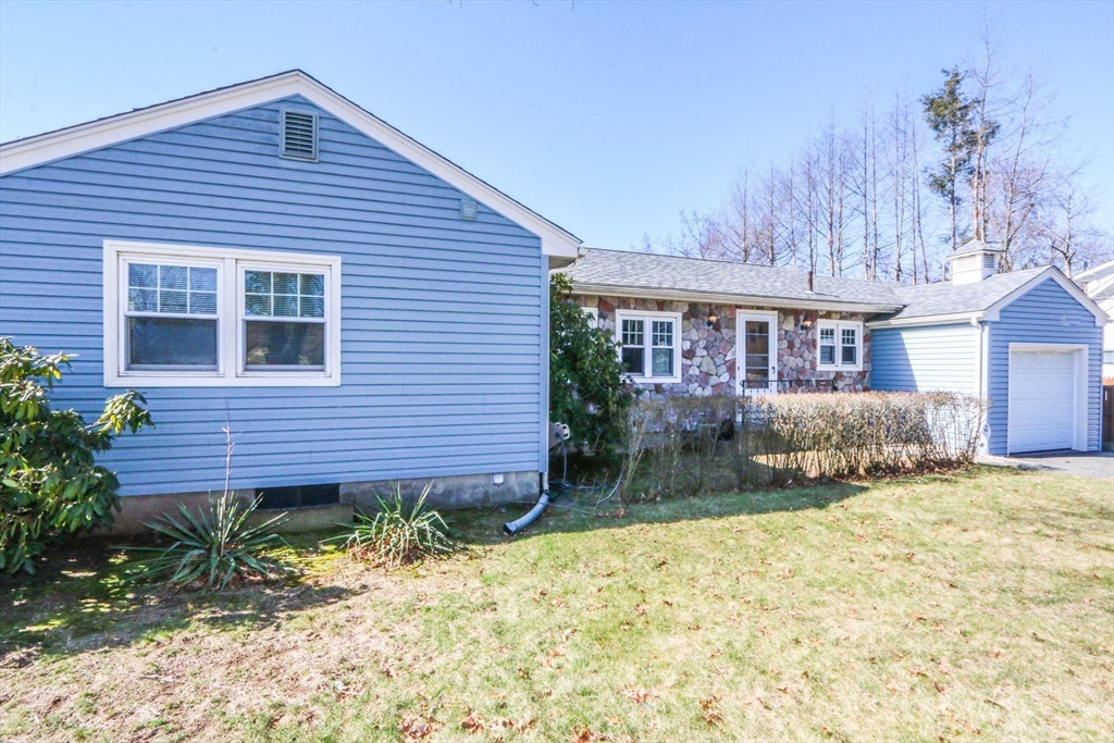 185 East Street Springfield, MA 01104 - Photo 3 of 26 a view of a house with a yard and sitting area